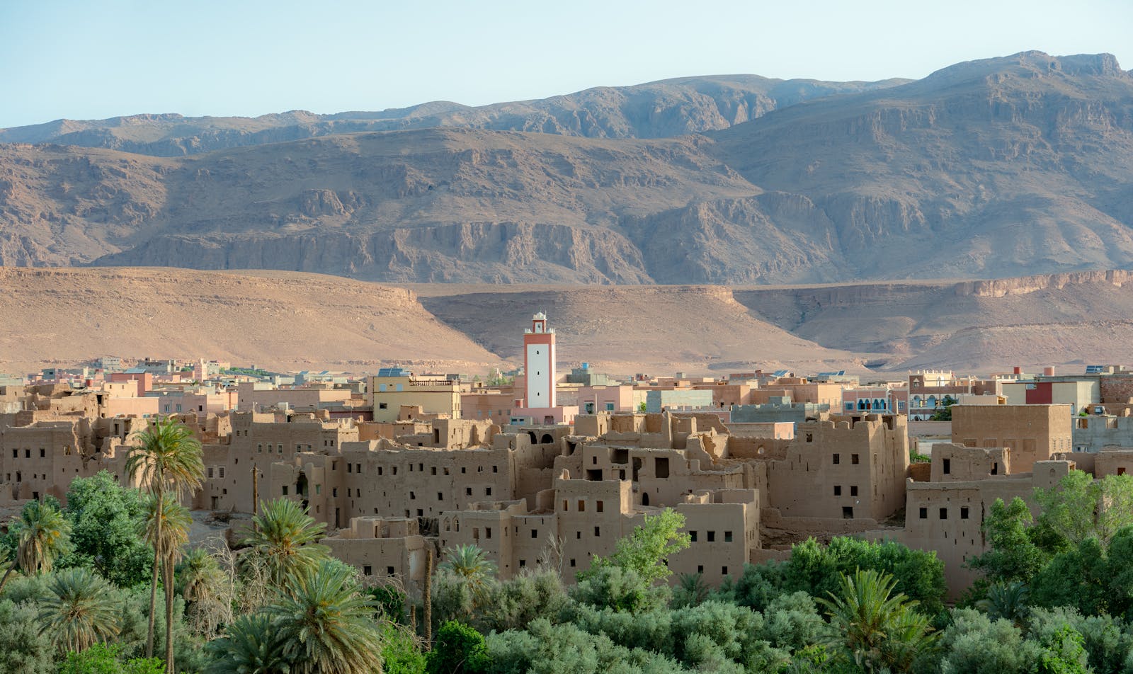 Beautiful panoramic landscape of Tinghir with traditional mud-brick buildings in Morocco.